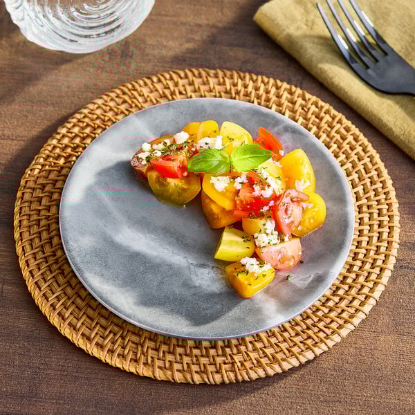An American Metalcraft gray marble melamine coupe plate with food on it.