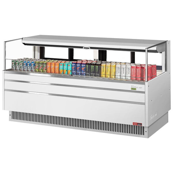 A white Turbo Air refrigerated display case with drinks on it.