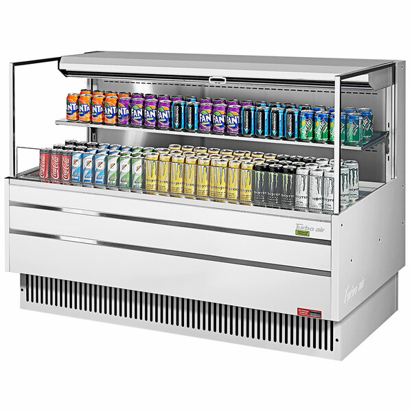 A white Turbo Air horizontal refrigerated open curtain merchandiser with drinks on a shelf.