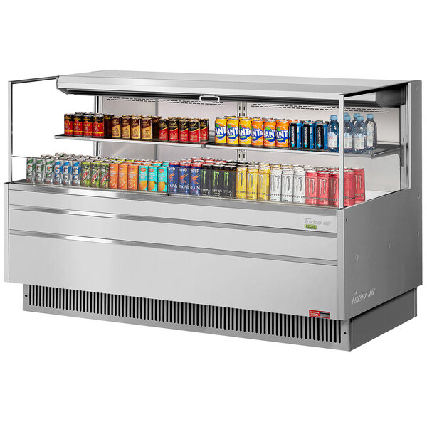 A Turbo Air stainless steel refrigerated display case with drinks on shelves.