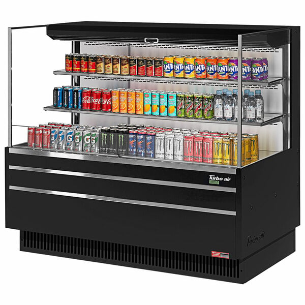 A black Turbo Air horizontal refrigerated open curtain merchandiser with cans of soda and different colored drinks on shelves.