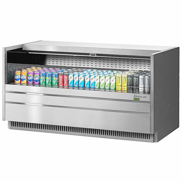 A Turbo Air stainless steel drop-in refrigerated display case with cans of soda.