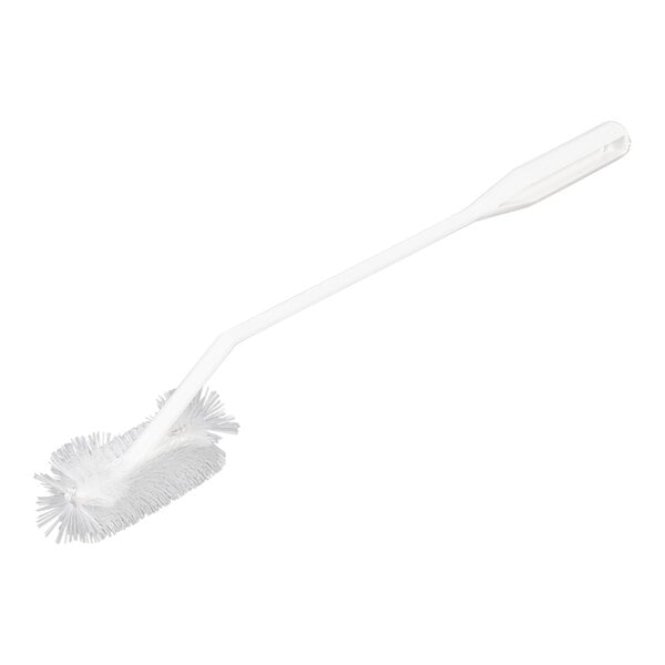 A white brush with a long handle.