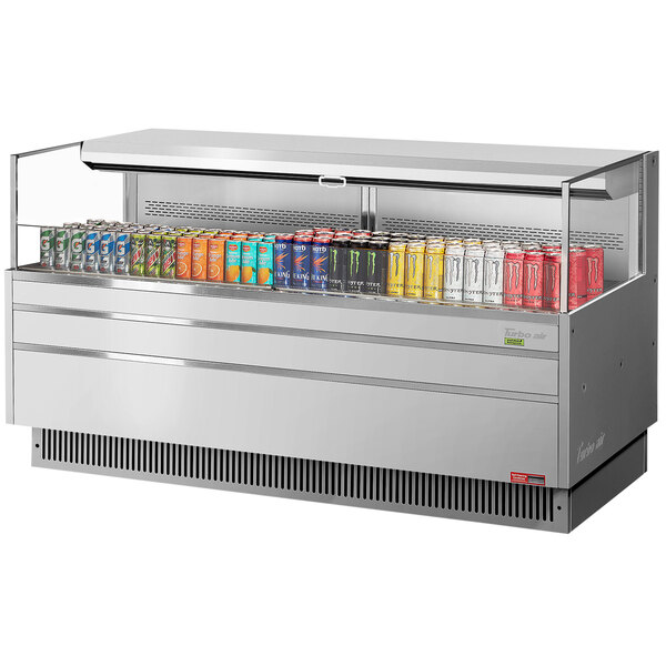 A Turbo Air stainless steel refrigerated display case with energy drinks inside.