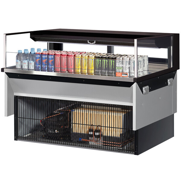 A Turbo Air drop-in refrigerated display case with a variety of energy drinks inside.