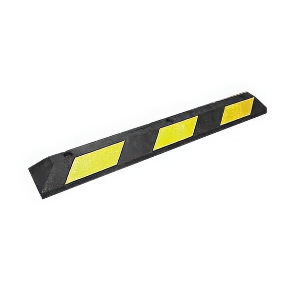 A black rubber parking block with yellow reflective strips.