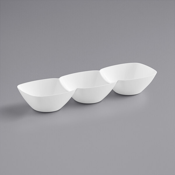 A white plastic mini tray with three compartments.