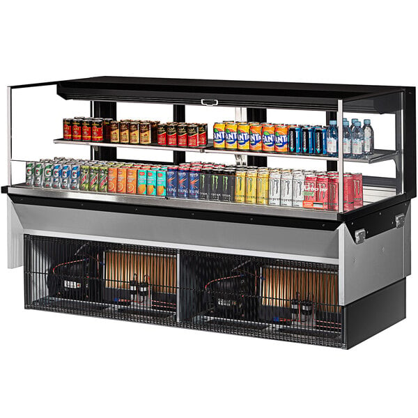 A Turbo Air drop-in refrigerated display case with drinks and beverages on shelves.