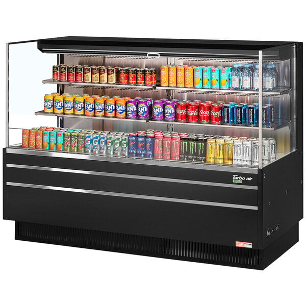 A black Turbo Air horizontal refrigerated open curtain merchandiser with drinks and snacks displayed.