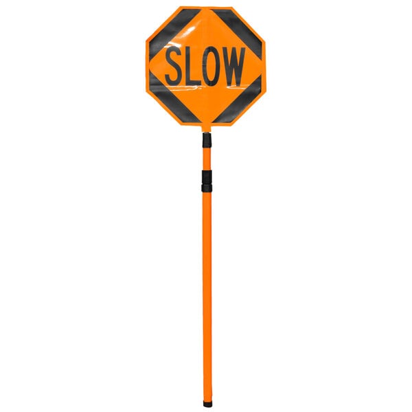 A white Cortina stop/slow paddle with black letters on a long orange handle.