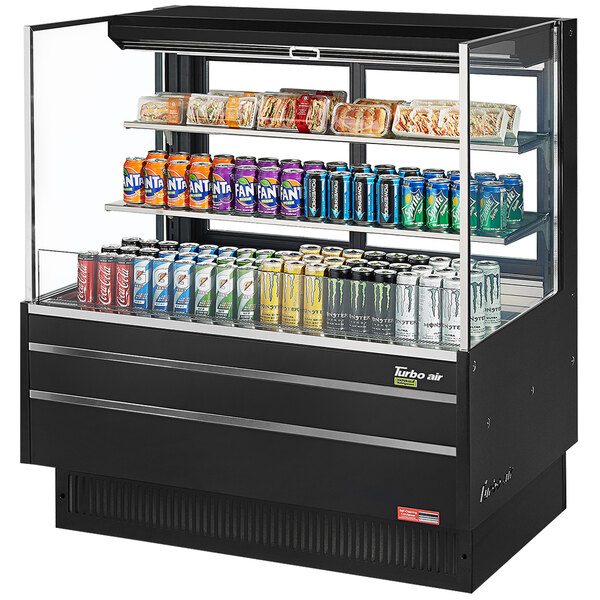 A Turbo Air black horizontal refrigerated open curtain merchandiser with drinks and cans inside.