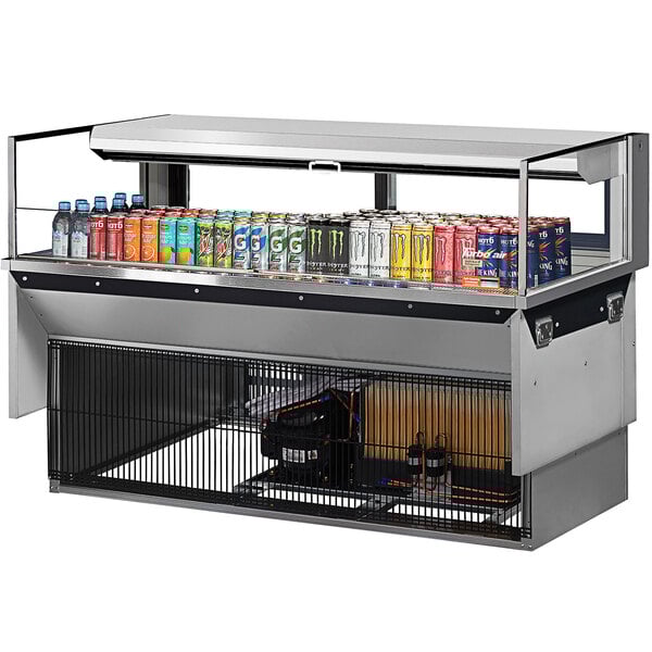 A Turbo Air drop-in refrigerated display case filled with drinks on a shelf.