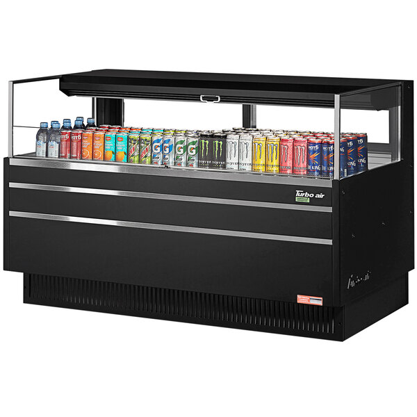 A black Turbo Air refrigerated curtain merchandiser with a variety of cans including soda.