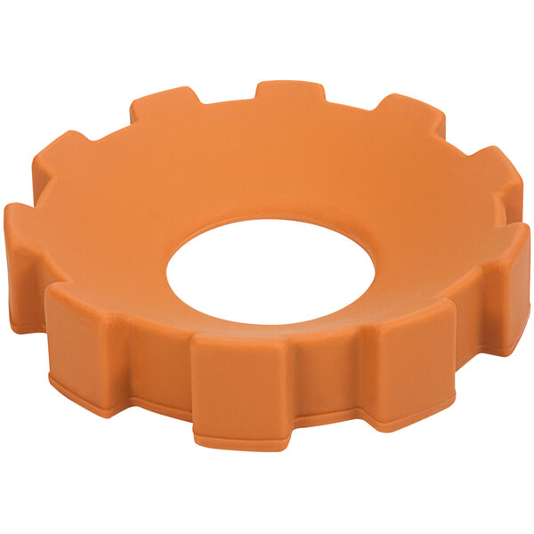 An orange gear shaped support stand for a Thermaco Trapzilla grease interceptor with a hole in the middle.