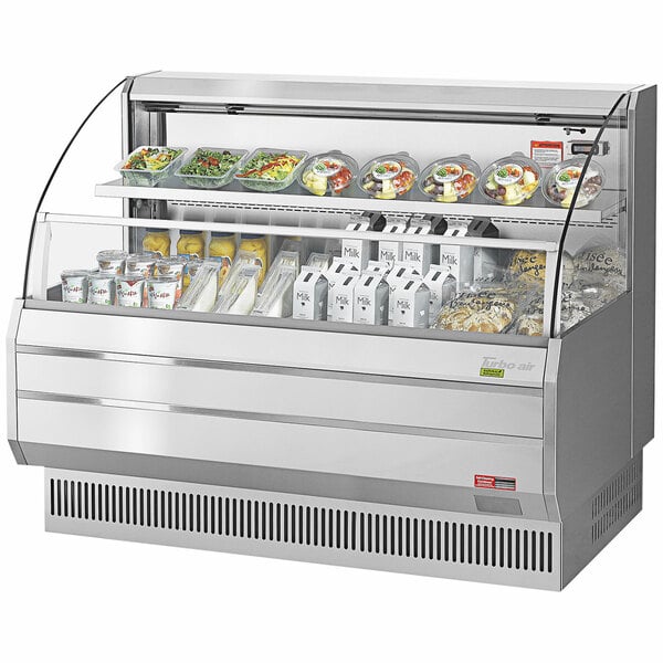 A Turbo Air stainless steel refrigerated horizontal curtain merchandiser with food displayed inside.