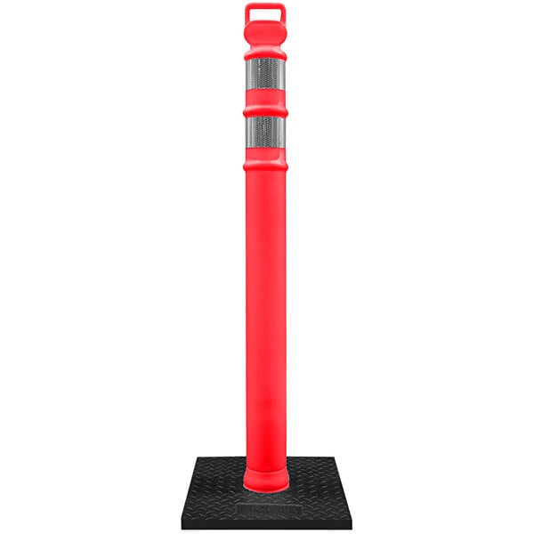 A red pole with a black base and reflective bands.