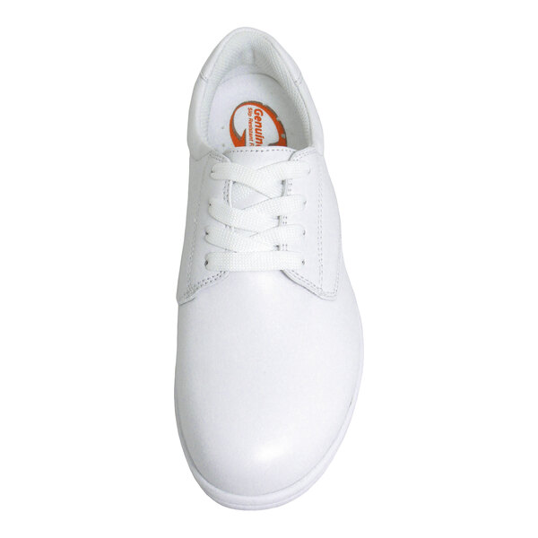 A white lace-up shoe viewed from above, featuring a smooth surface and a rounded toe.