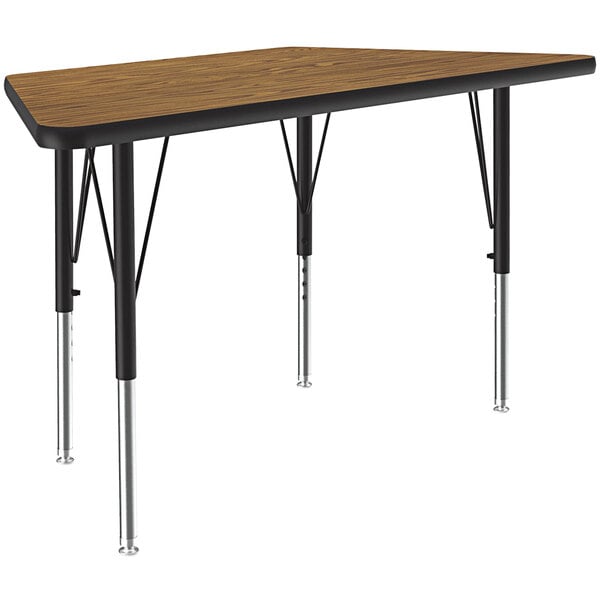 A trapezoid shaped Correll activity table with a brown surface.