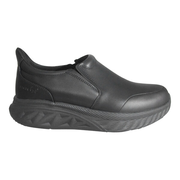 A black slip-on shoe with a thick, textured sole and smooth upper material.