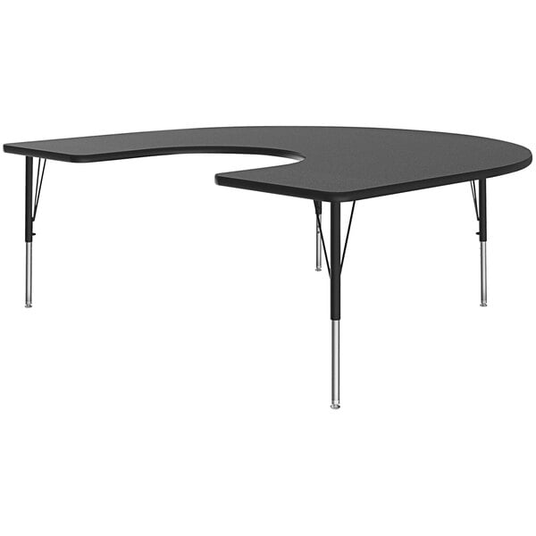 A black half-moon shaped Correll activity table with two legs.