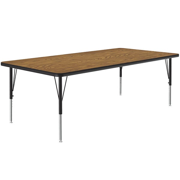 A Correll rectangular activity table with a medium oak top and metal legs.