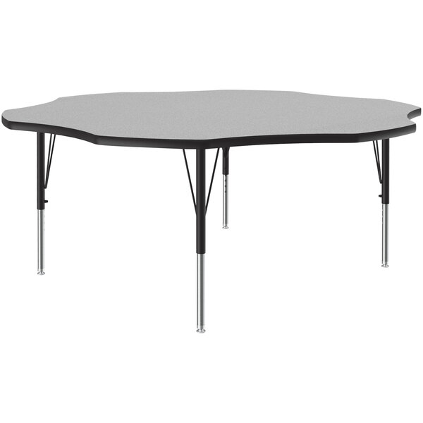 A hexagon shaped Correll activity table with a gray and black top.