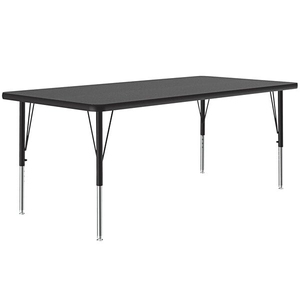 A rectangular black table with silver legs.