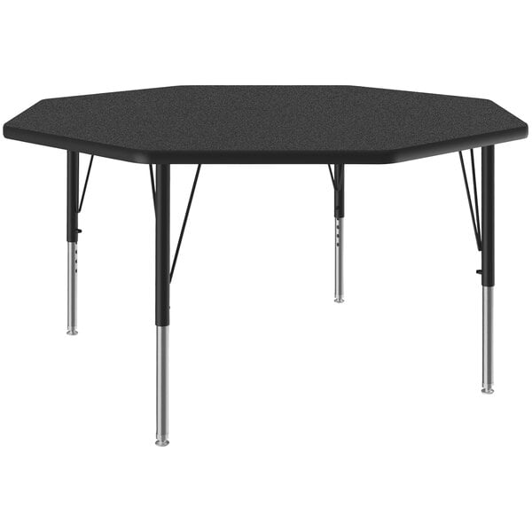 A black hexagon shaped Correll activity table with adjustable silver legs.