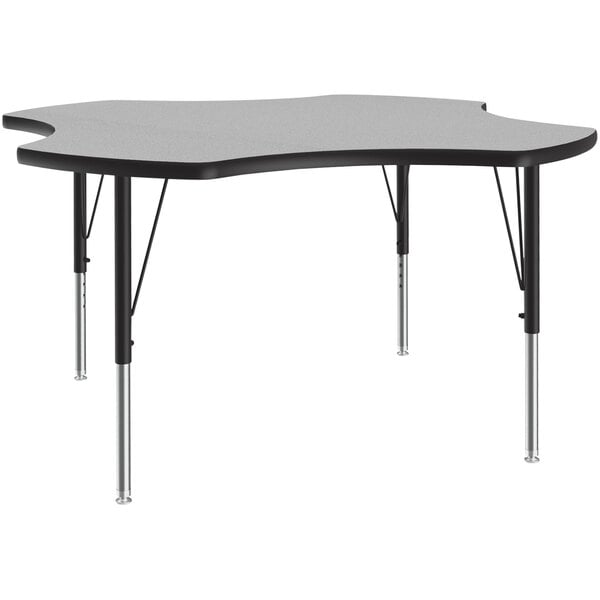 A grey and black Correll activity table with adjustable legs.