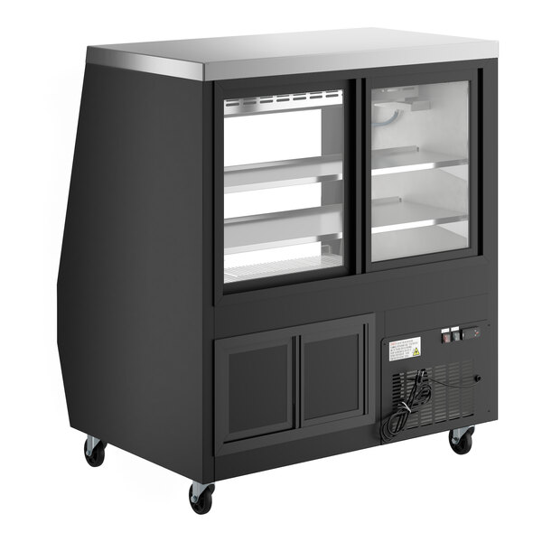 An Avantco black refrigerated deli case with glass doors.