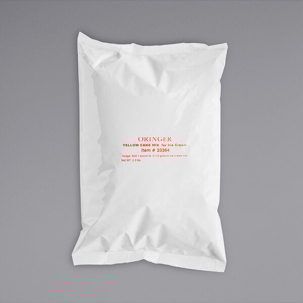 A white plastic bag with orange and red text for Oringer Cake Batter Dry Mix.