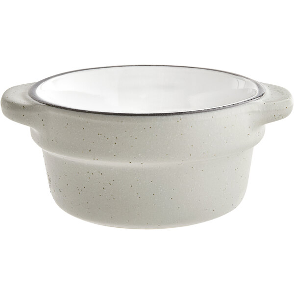 An Acopa Embers stoneware sauce cup with a matte grey finish.