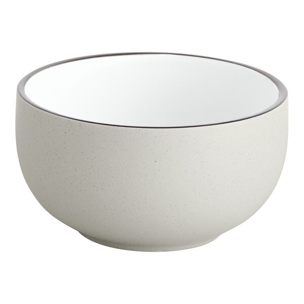 An Acopa Embers stoneware bowl with a grey matte finish and a black rim.