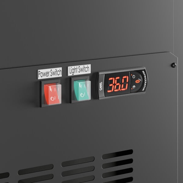 The digital display on a black Avantco refrigerated deli case with orange numbers.