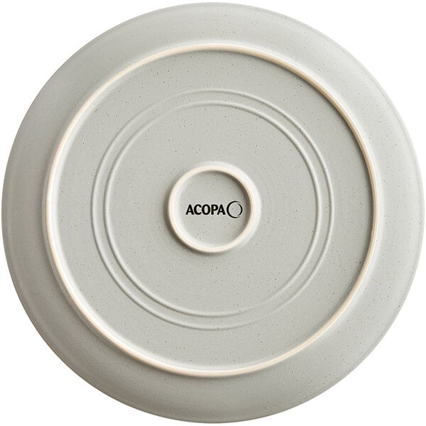 A grey matte Acopa stoneware plate with a circular design in the middle.