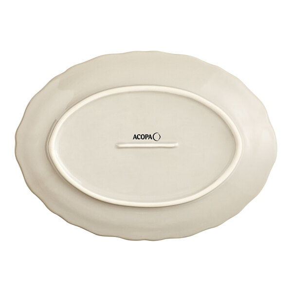 An Acopa Warm Gray porcelain oval platter with a white oval scalloped design.