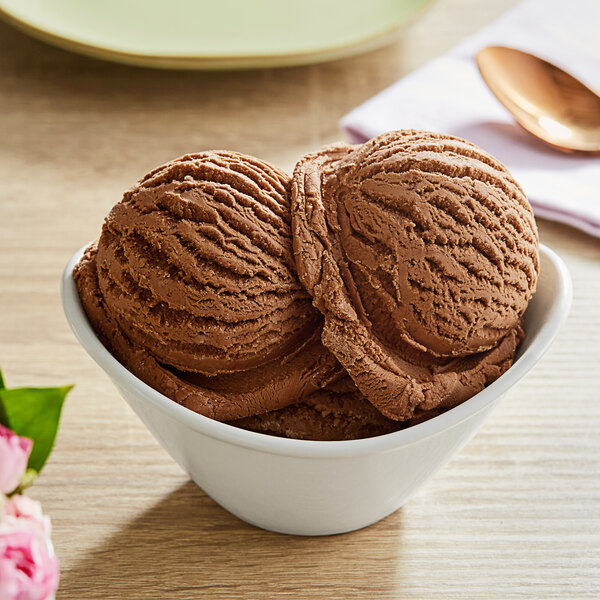 A bowl of Oringer coffee-flavored ice cream with a spoon.