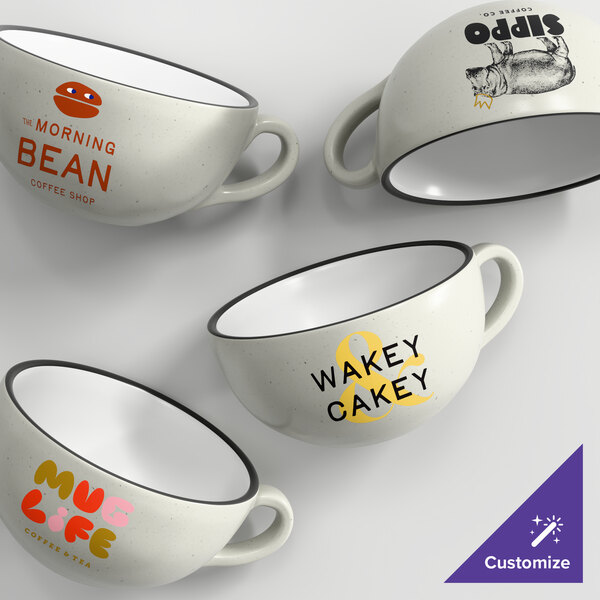 A set of four gray matte stoneware cups with various custom printed designs and text.