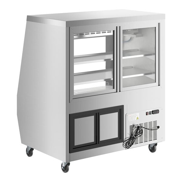 An Avantco stainless steel deli case with glass doors.