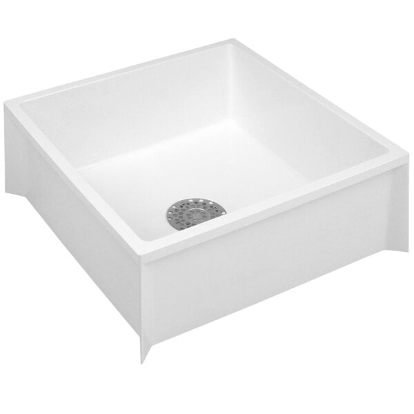 A white square fiberglass mop sink with a drain.