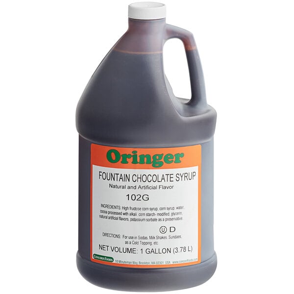 A jug of Oringer Chocolate Fountain and Milkshake Syrup with a label.