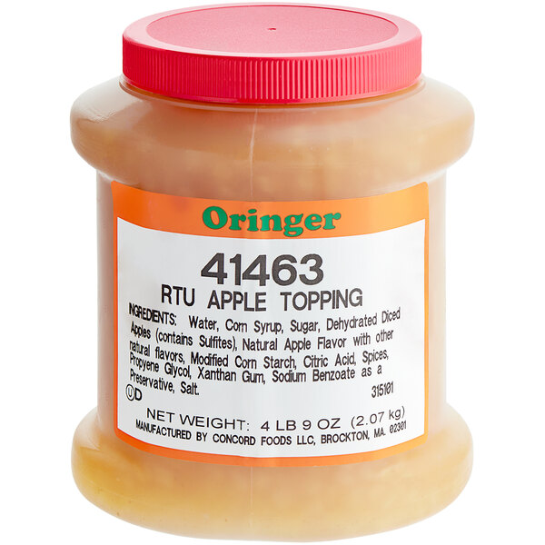 A jar of Oringer Apple Topping on a counter.