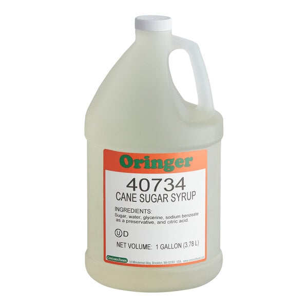 A white plastic jug of Oringer Cane Sugar Syrup with a red and green label.