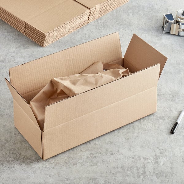 A stack of brown Lavex cardboard shipping boxes.