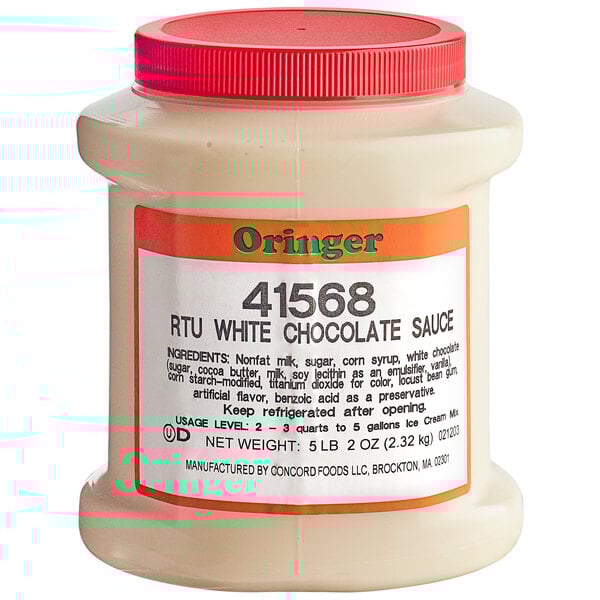 A plastic container of Oringer White Chocolate Hard Serve Ice Cream Base with a red lid.