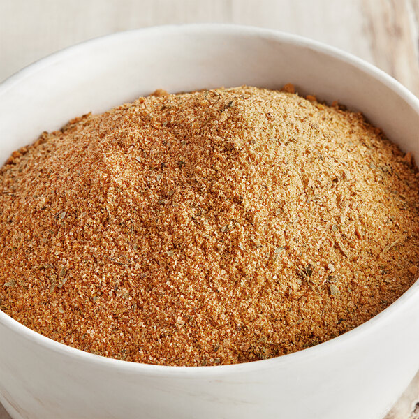 A bowl of McCormick Culinary Savory Fajita seasoning.