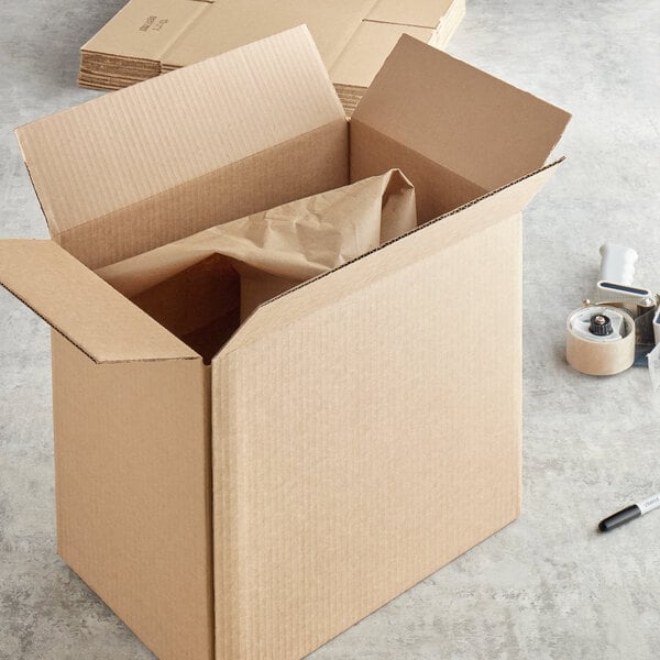 A Lavex  kraft cardboard shipping box with tape on it.