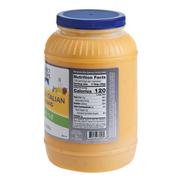 A large plastic container of AAK Select Recipe Golden Italian Dressing.