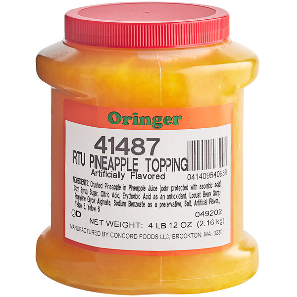 A container of Oringer pineapple dessert topping with yellow liquid inside.