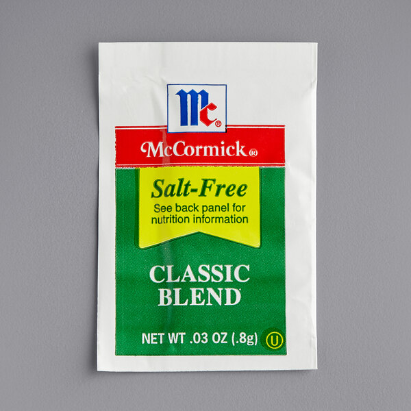 A McCormick Salt-Free Classic seasoning blend packet with a green and red label.